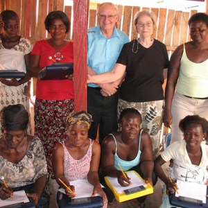 Global Mamas volunteers with women receiving employment training and assistance