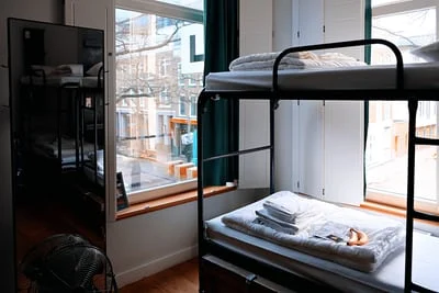 image of a bunk bed inside a hostel room